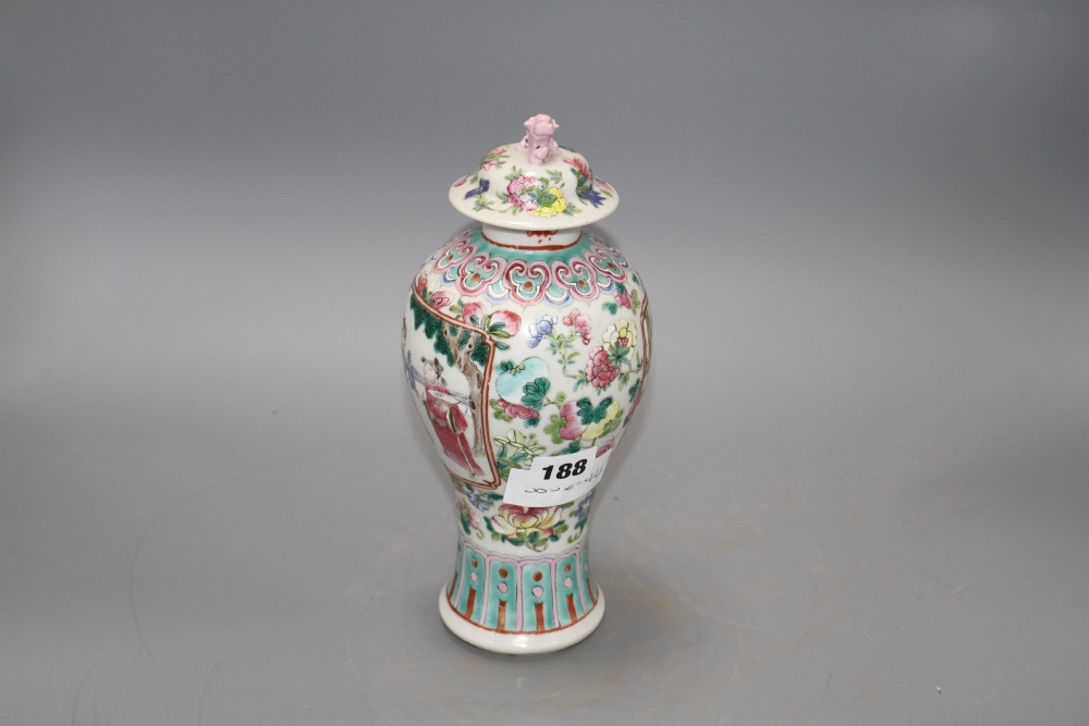 A 19th century Chinese famille rose baluster vase and cover, height 24cm
